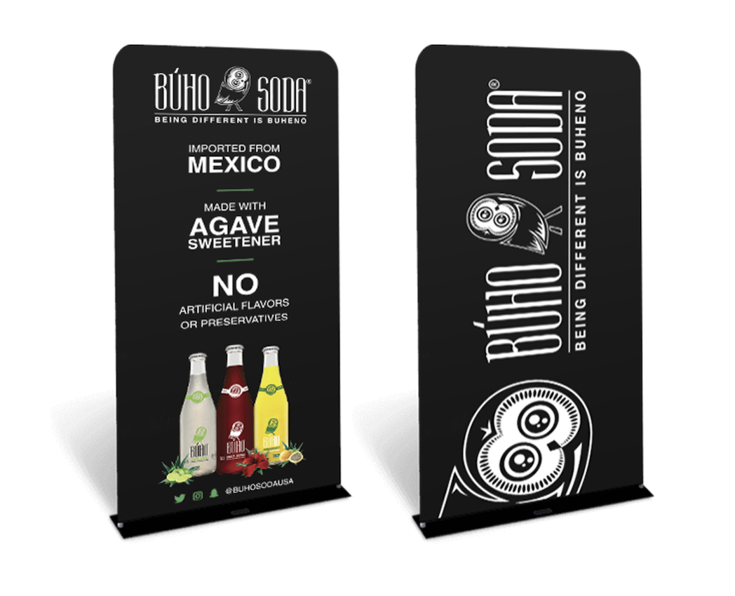 A stand showcasing the art style and flavor selection of Buho Soda